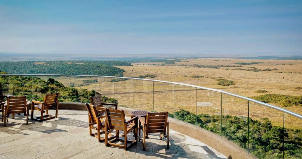 mara serena view from a private deck and the best time to travel to masai mara which is during the great wildebeest migration